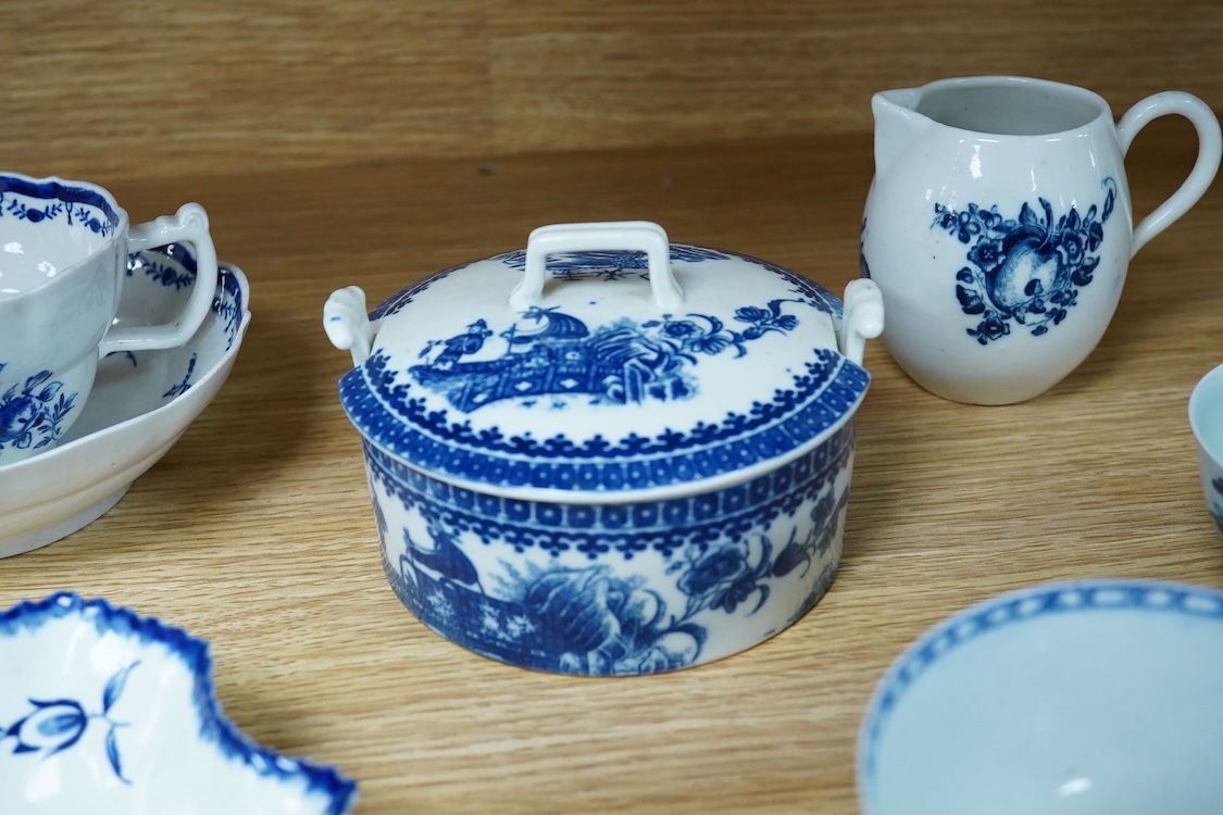 A group of 18th century Worcester and Liverpool porcelain teaware and a Caughley Cormorant fisherman butter tub and cover.